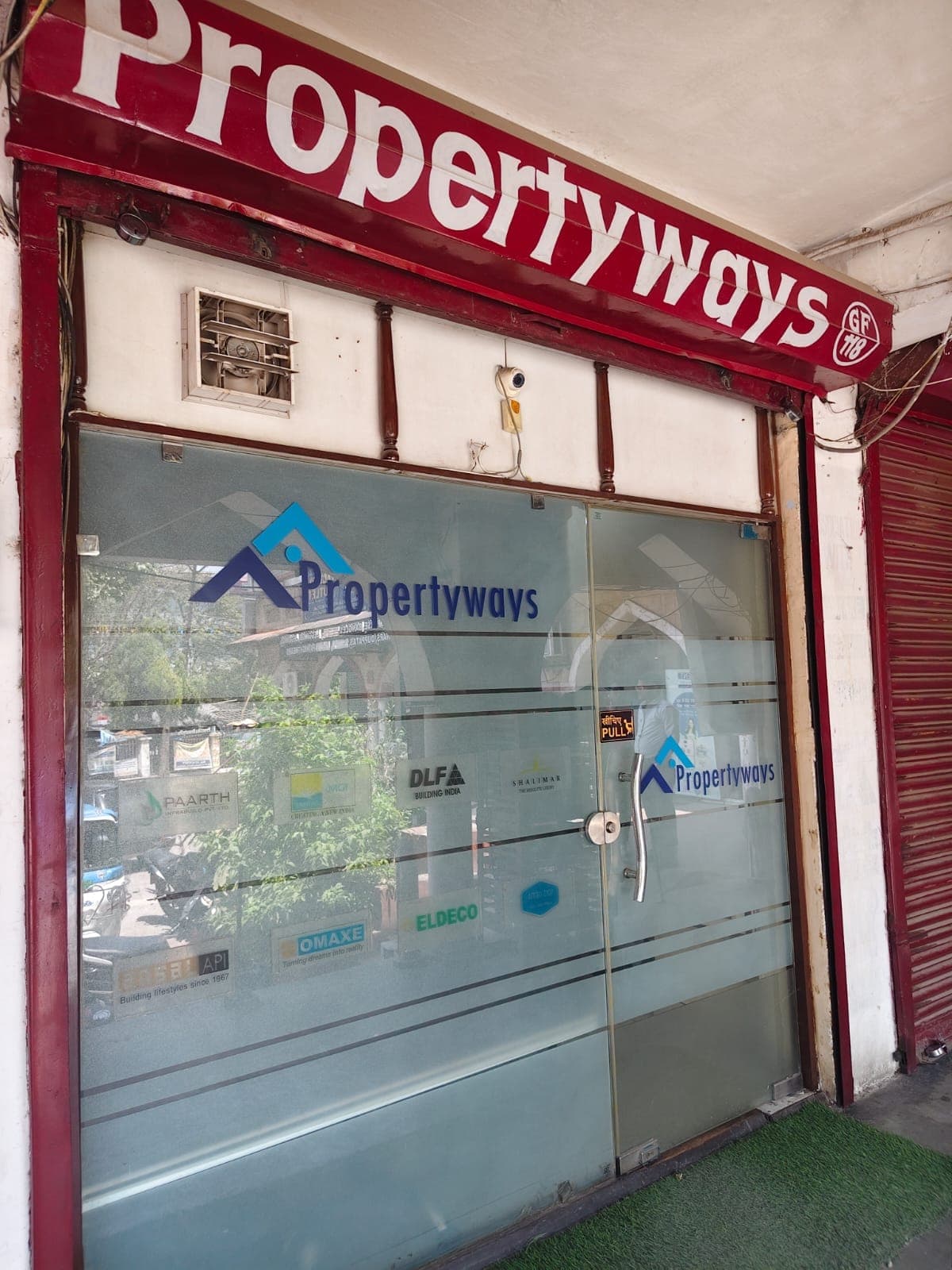 PROPERTYWAYS office storefront entrance at Khazana Complex GF-118, Ashiyana, Lucknow